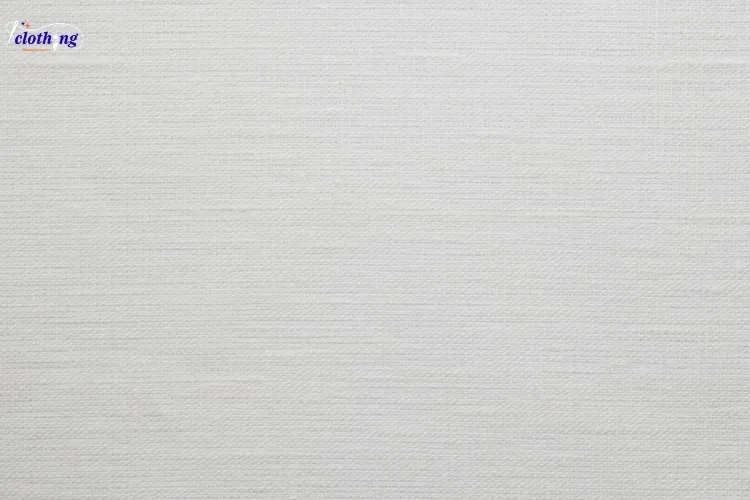 What is fabric — premium cotton textile macro, natural white cloth surface