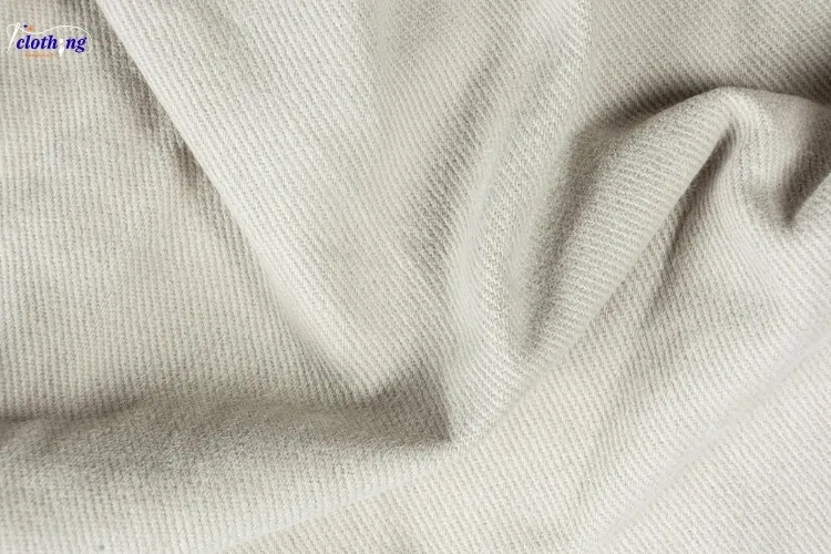 Cotton fabric texture close up — soft breathable 100% cotton textile