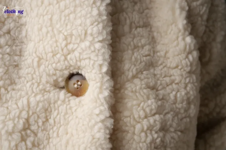 Fleece lining texture — soft creme hoodie inside fabric