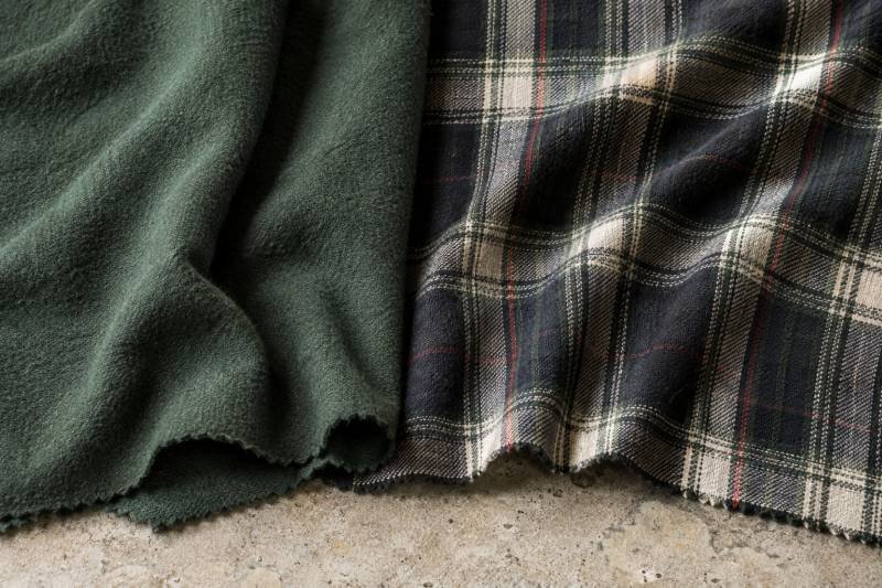 Solid flannel fabric shown next to classic plaid flannel pattern